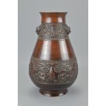 A CHINESE BRONZE VASE