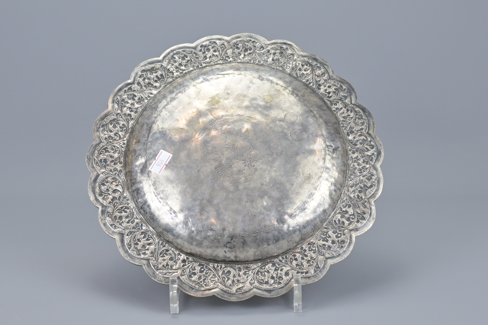 AN INDIAN EMBOSSED WHITE METAL DISH - Image 2 of 4