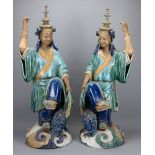 A Large Pair of Chinese Green Glazed Pottery Danci