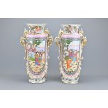 A Pair of Late 19th Century Chinoiserie Famille Rose Style Samson Vases