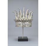 A Chinese Miao Ethnic Minority White Metal Wedding Headpiece and Stand
