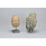 Two Models Of Buddha Heads