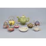 Nine Oriental Teapots