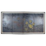 A Japanese four-fold screen painted with flowers on a dark ground. Framed in lacquered wood with