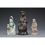 Three Chinese ceramic Guanyin figures. Each in different glazes. Heights 11.5cm - 17.5cm (3)