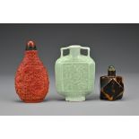A Chinese 19th Century faceted tortoise shell inlaid medicine / snuff bottle, four panels