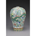 A Chinese 19th Century doucai porcelain vase. The meiping shaped vase decorated with dragon and