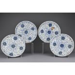 A set of four Chinese blue and white porcelain dishes each decorated with chrysanthemum scrolls