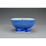 A Chinese 19th Century porcelain squared formed bowl. The bowl with powder blue exterior decorated