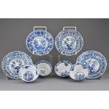 A group of Chinese 19th Century blue and white porcelain cups and saucers. Four matching saucers