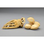 A Japanese ivory netsuke in the form of a finger citron/Buddha's hand, Meiji period. Together with
