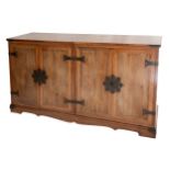 A Charlotte Horstmann Hong Kong hardwood three-piece sideboard. The left section has two doors and