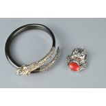 A straits Chinese Peranakan dragon bangle in shell and white metal together with another dragon