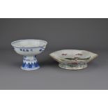 A Chinese 19th Century blue and white porcelain stem bowl decorated with a lotus pond scene, the