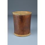 A Chinese Huanghuali wood brush pot with added hardwood rim and base. Height 10.5cm. Diam. 9cm