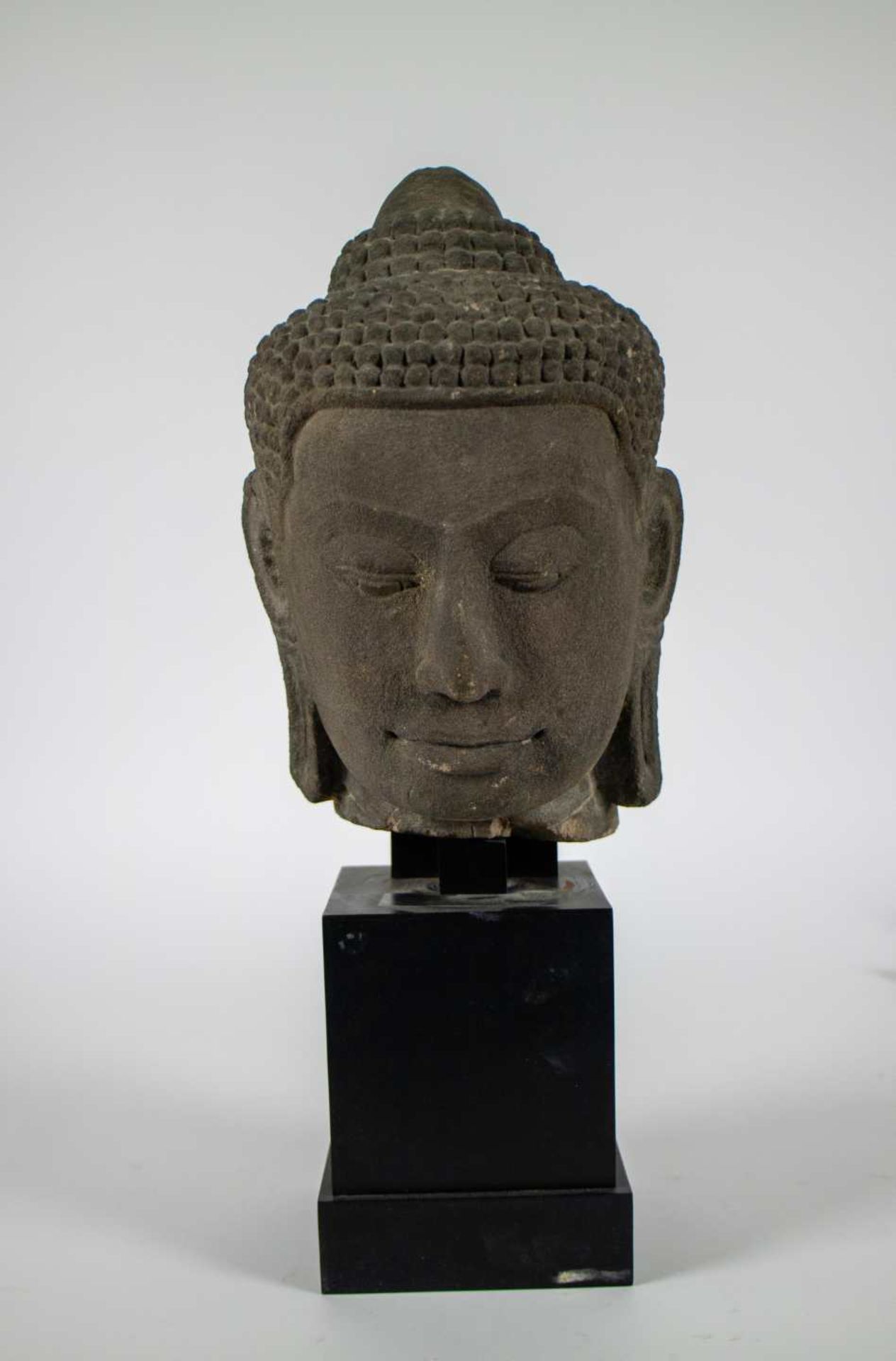 Thai carved stone head of a Buddha