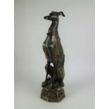 Bronze sitting greyhound