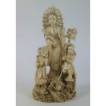 Chinese sculpture group of Guanyin with 2 children