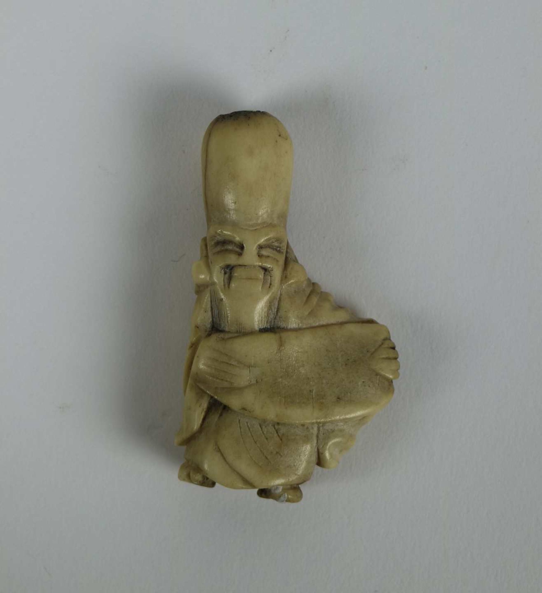 Carved deer horn netsuke or Fukurokuji