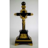 Crucifix table clock with revolving sphere