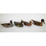 Lot with 4 wooden antique decoy ducks