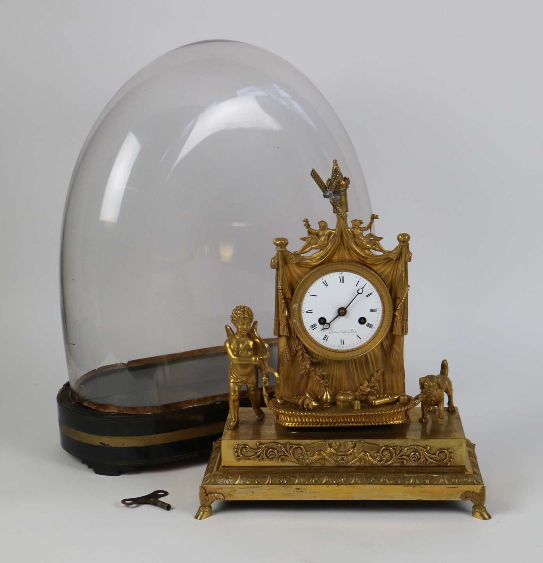 Fire gilded clock 'Gaston Jolly Paris'