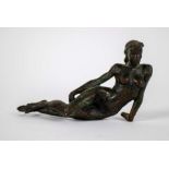 Bronze lying naked woman