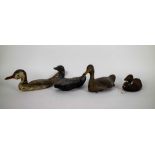 Lot with 4 wooden antique decoy ducks