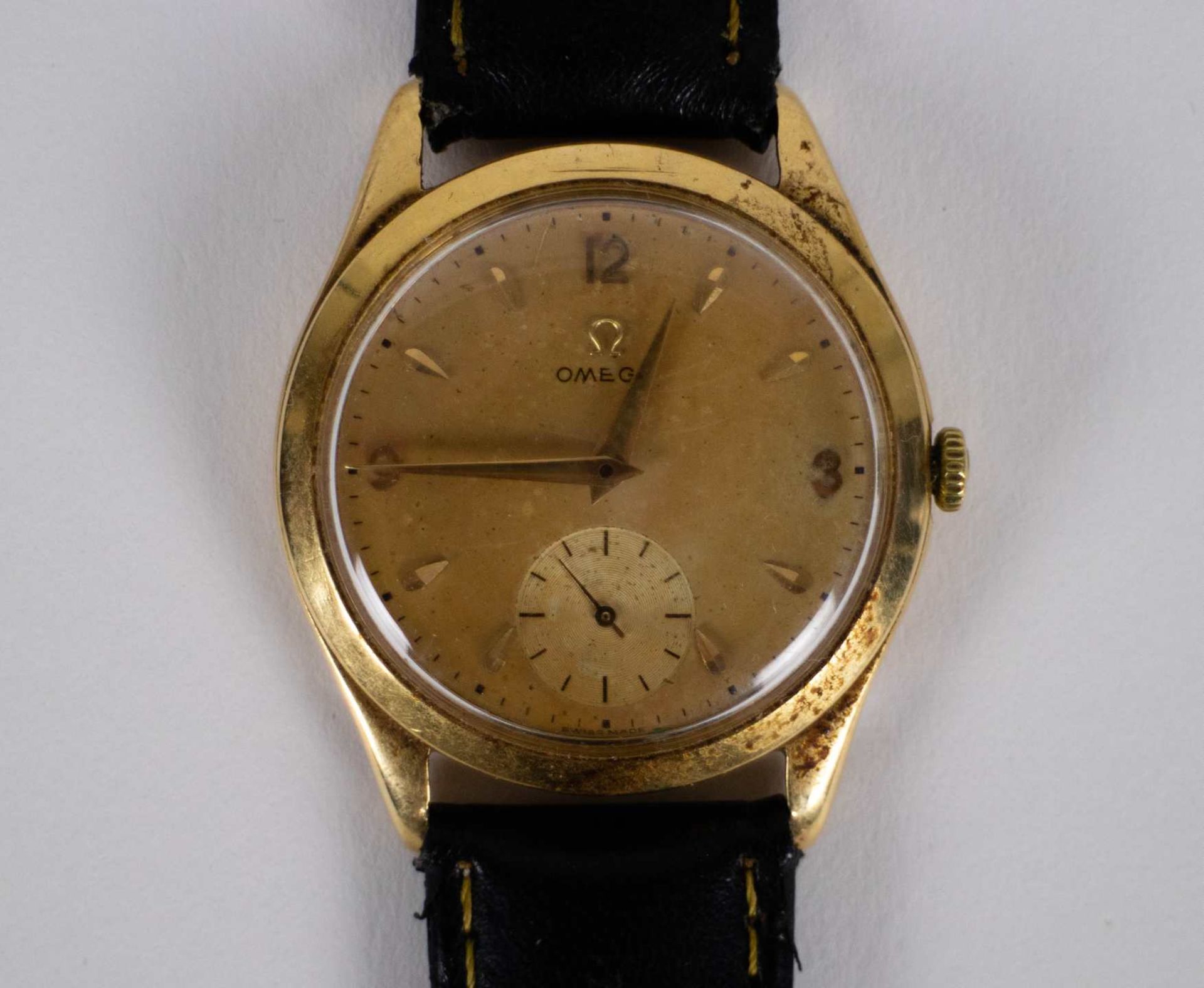 Gold Omega watch