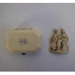 Ivory purse and figure group