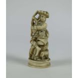 Carved ivory figure of a bagpipe player with his dog and sheep DIEPPE