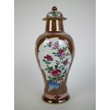 A Qianlong famille rose vase with cover