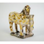 A Faience horse with vase, 18/19th C.