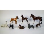 Lot with porcelain horses and dogs