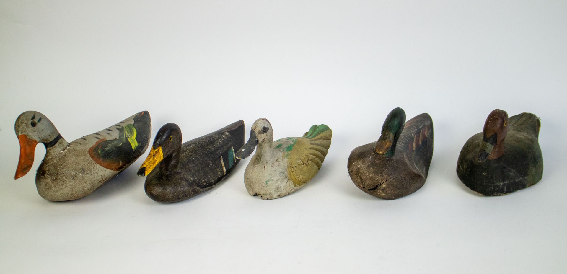 Lot with 5 old wooden decoy ducks