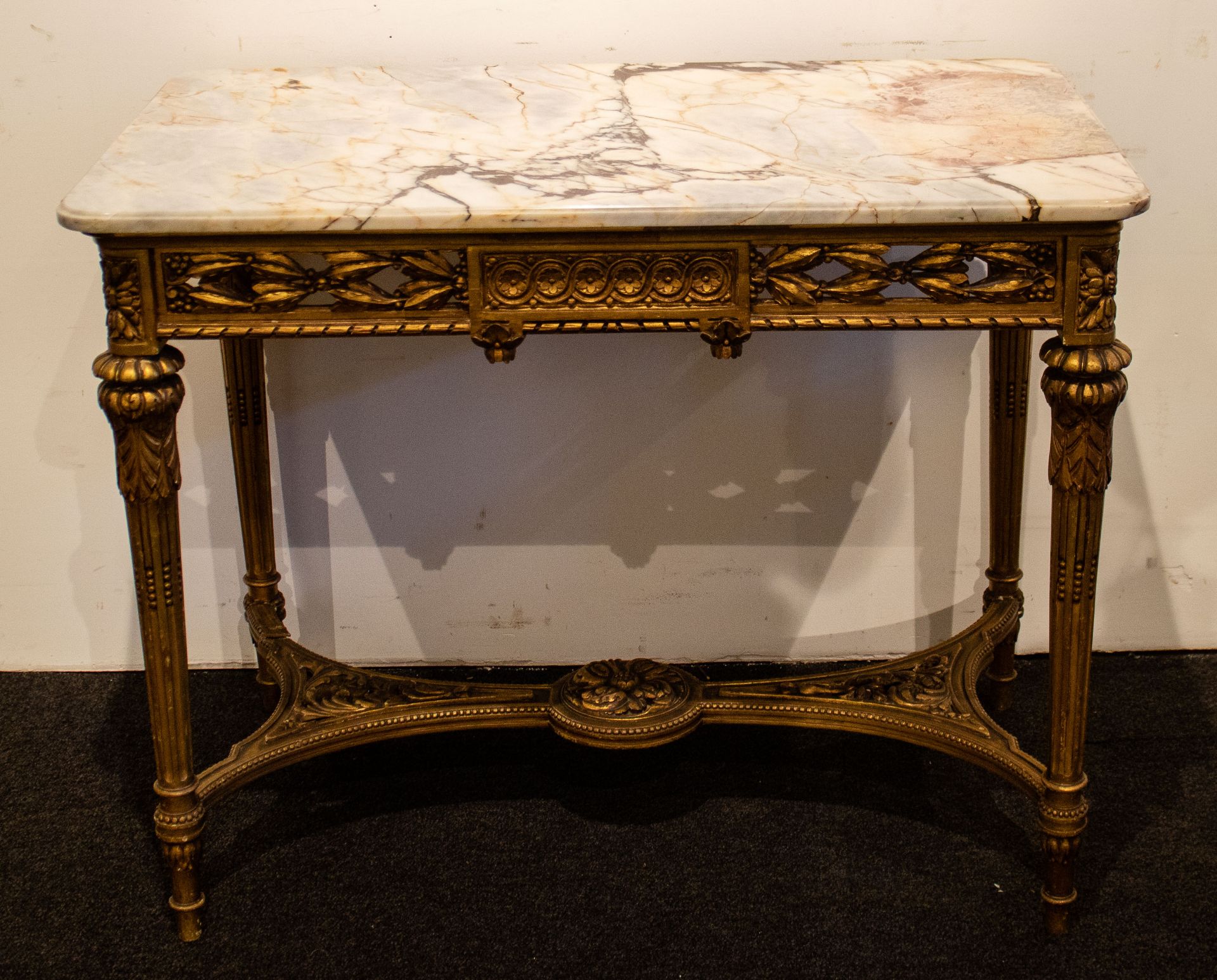 Gilded side table with marble top