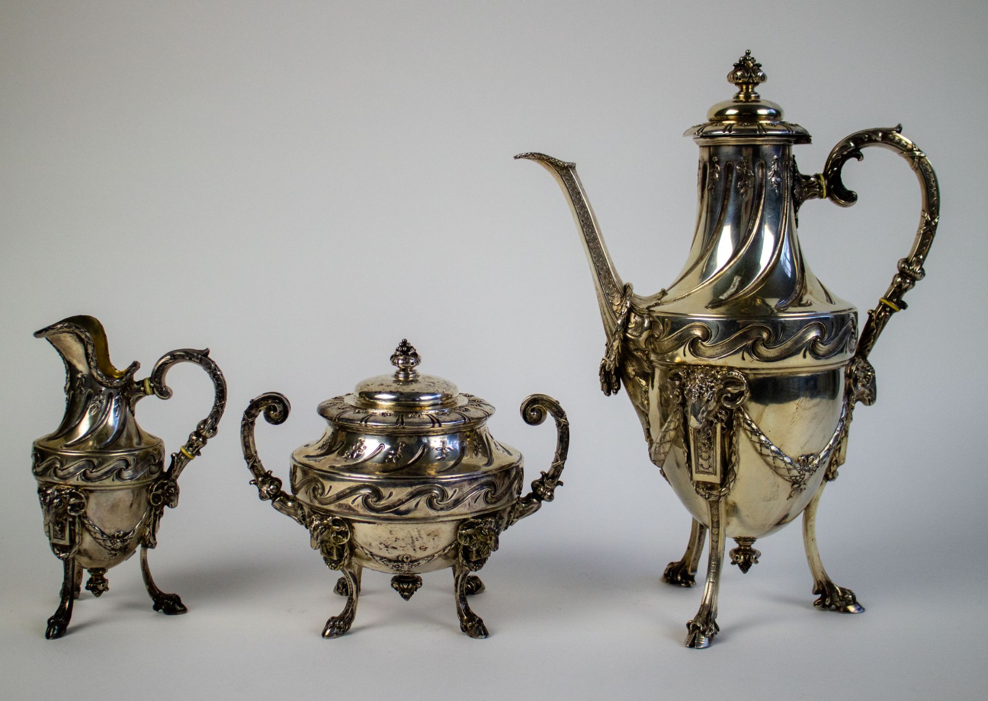 A silver coffee pot, milk bowl and a sugar caster Wolfers 800