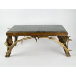 Lounge table with deer horns.