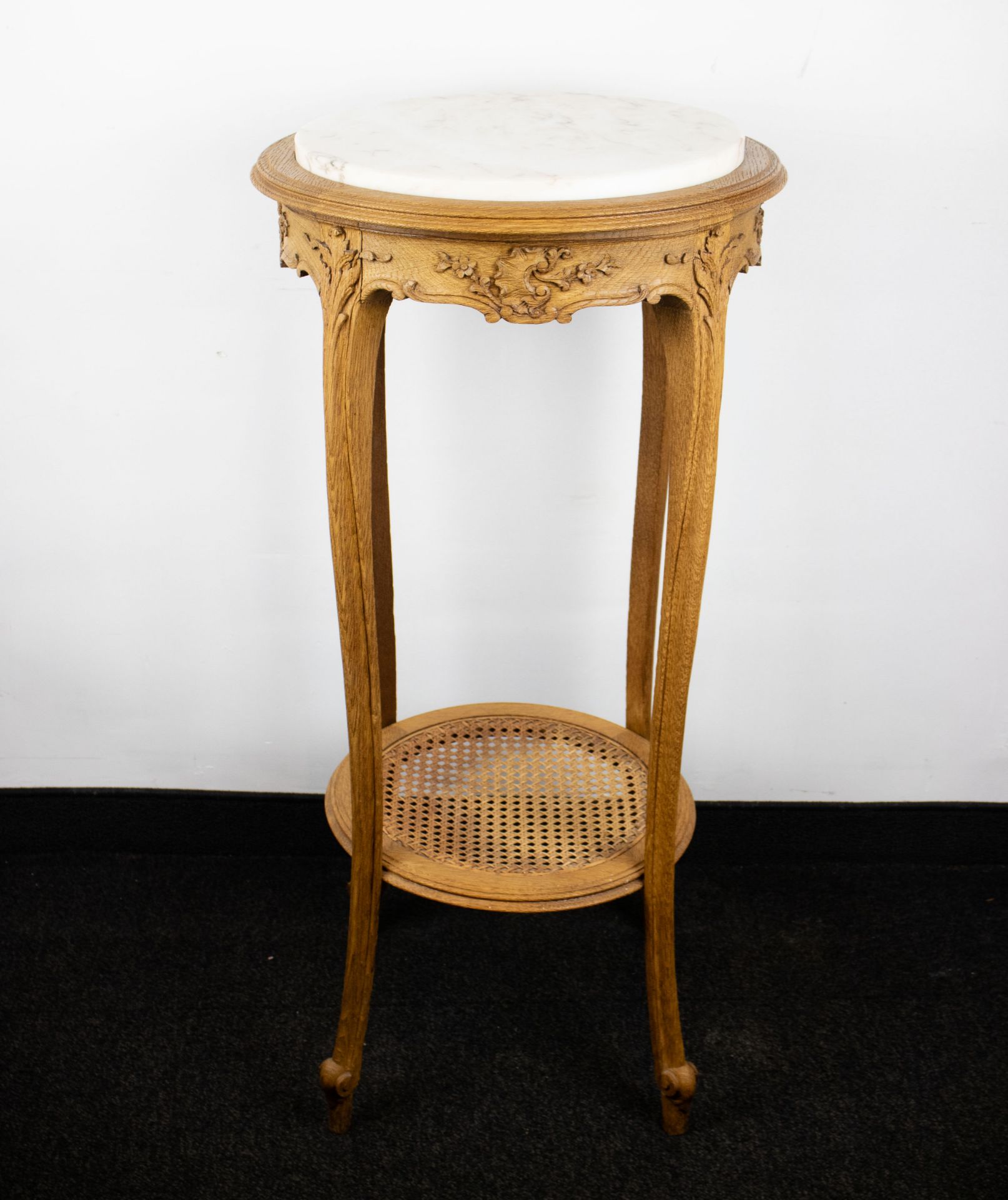 Wooden pedestal with marble top