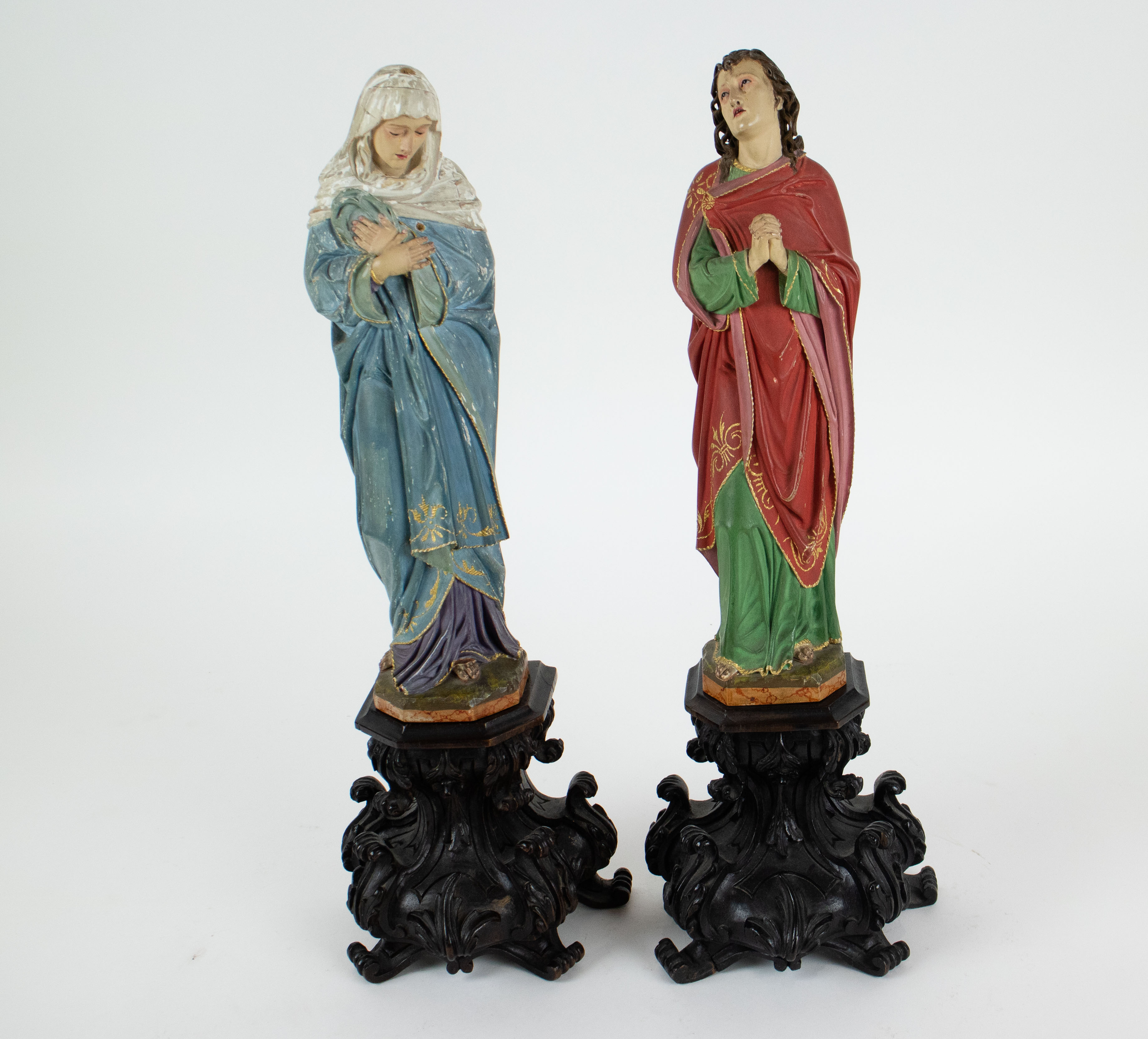 A pair of wooden holy figures