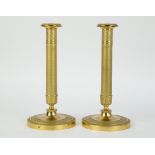 A pair of Empire candlesticks