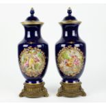 A pair of handpainted Sèvres style vases
