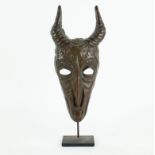 Bronze mask sculpture