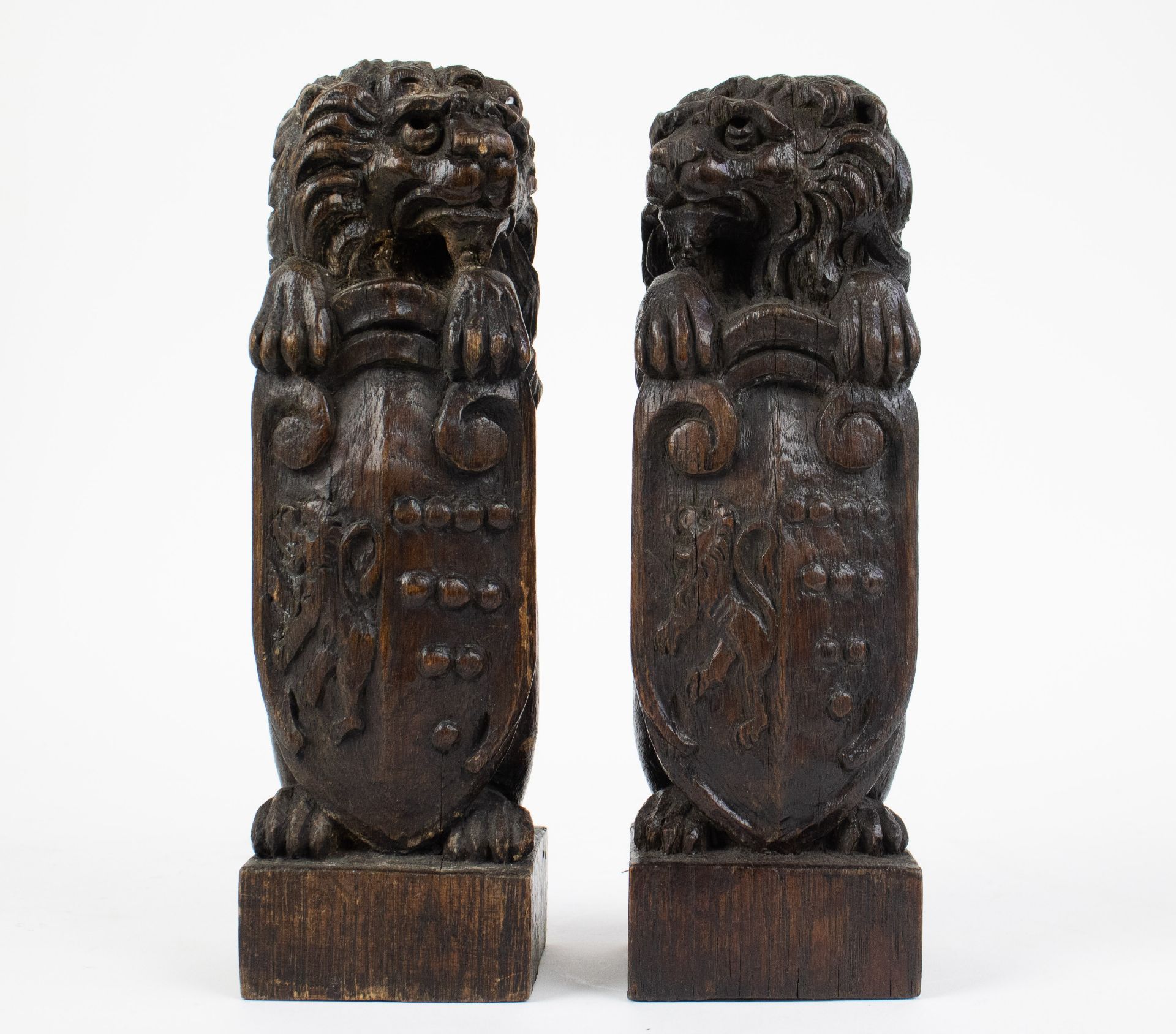 A pair of wooden lions