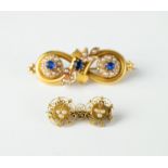 Gold brooch with clovers and gold brooch with blue stones 18 kt