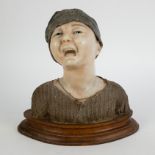 Wax buste of a crying child