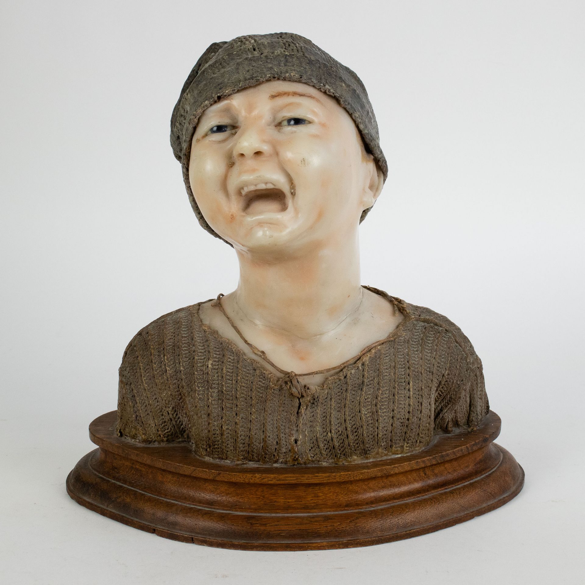 Wax buste of a crying child