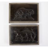 2 bronze plaques with panthers