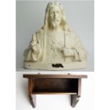Christ plaster on wooden console