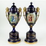 A pair of blue Limoges vases